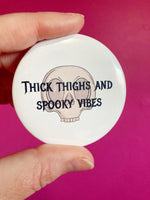 Thick Thighs Spooky Vibes pinback button 2.25”