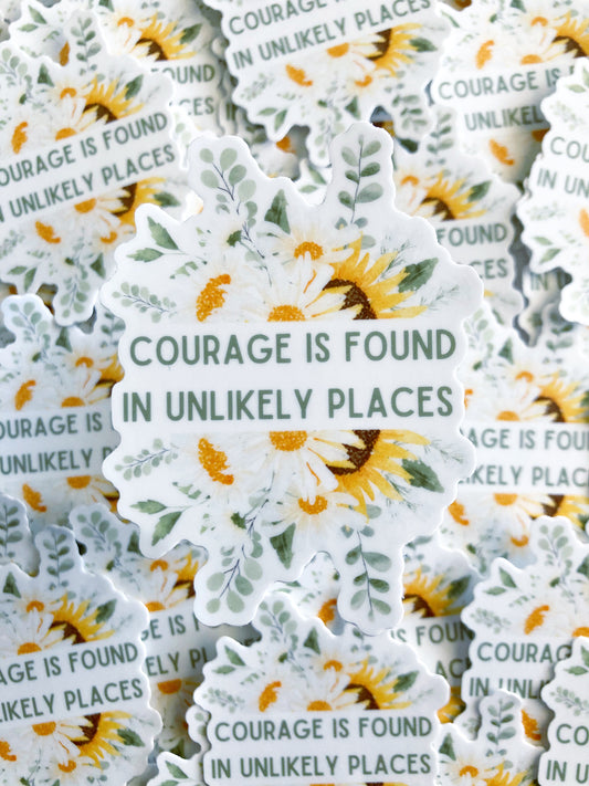 A collection of stickers. Each sticker has A floral design with the text ‘courage is found in unlikely places’