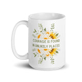 Courage Is Found In Unlikely Places White glossy mug