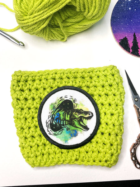 Dinosaur reusable crochet coffee cozy